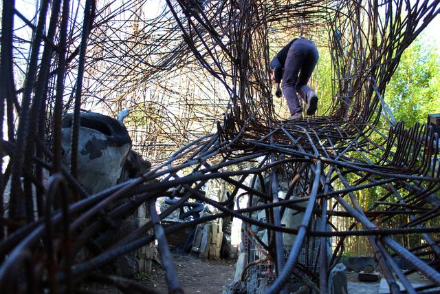 Michael Henderson has turned his West Seattle backyard into a giant playground. But neighbors, and the city, say it’s in violation. Photos by Sara Bernard