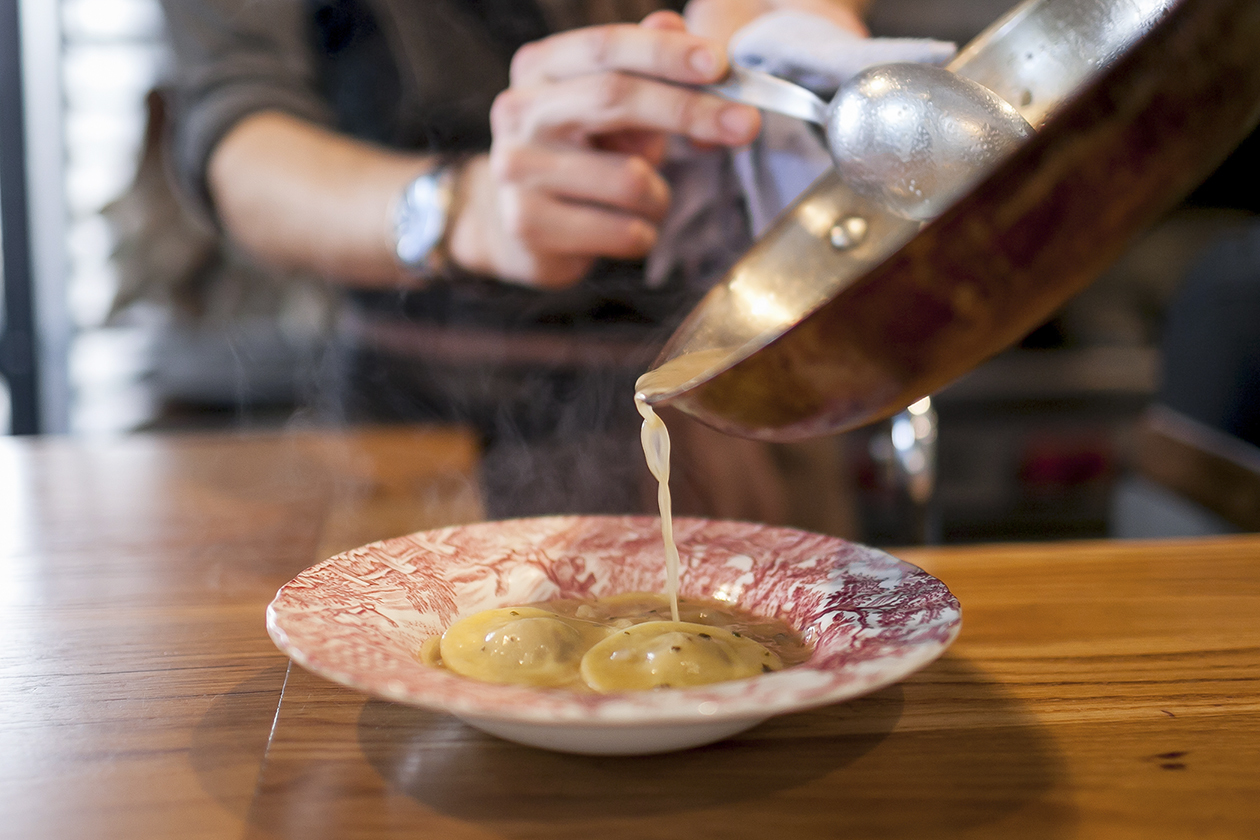 The duck ravioli is so-so, but the broth is divine. Photo by Nathaniel Solis