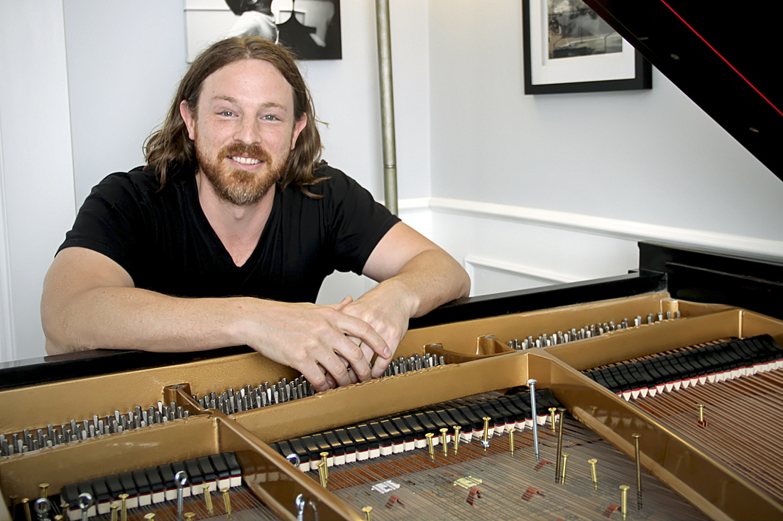 Pianist Jesse Myers and his exploded keyboard. Photo by Maggie Molloy