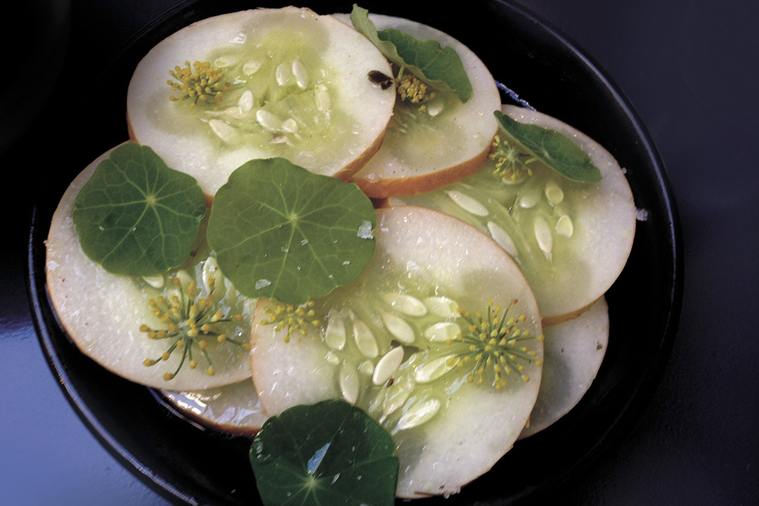 Poached cucumber with kumbu, dill, and flowers. Photo by Nicole Sprinkle