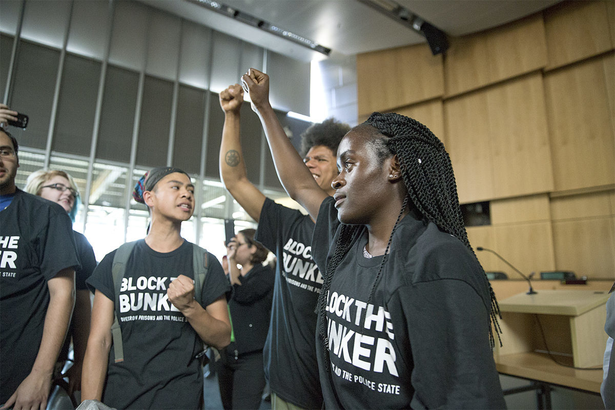 Protesters in city hall. Photo by Alex Garland.