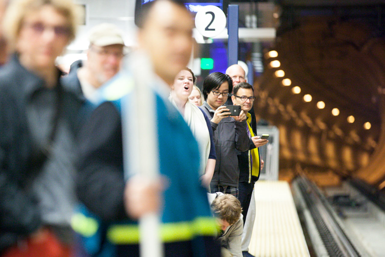 Riders gather to board the light rail at the Capitol Hill Station in Seattle during the station’s first day of operation in March. Jeremy Dwyer-Lundgren / Seattle Weekly