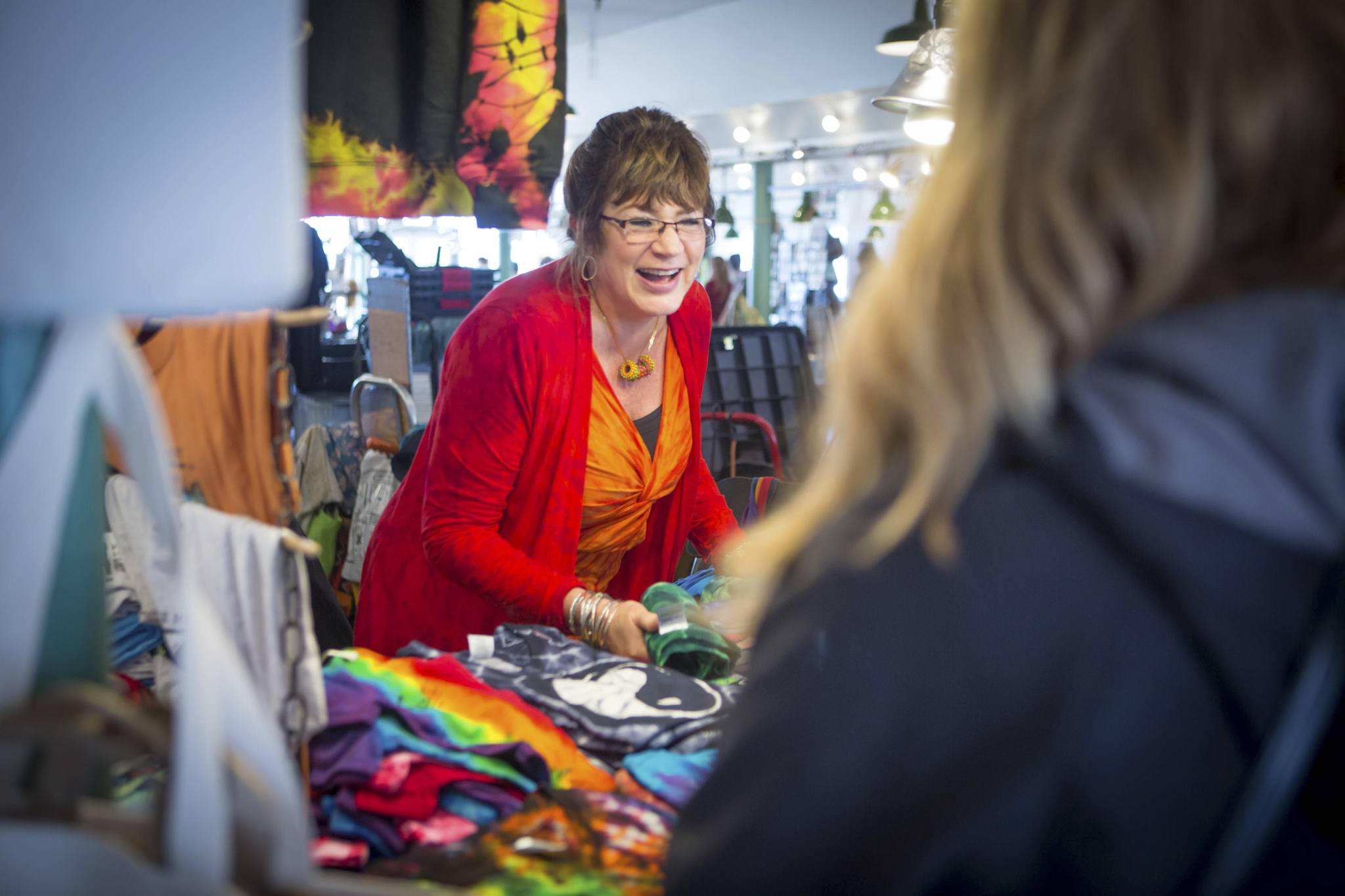 Sharon Shaw has become a Market fixture while helping members of her community like busker Emery Carl (below) and artist Sandi Schmidt (bottom). All photography by Rosemary Dai Ross/POSTheadshots