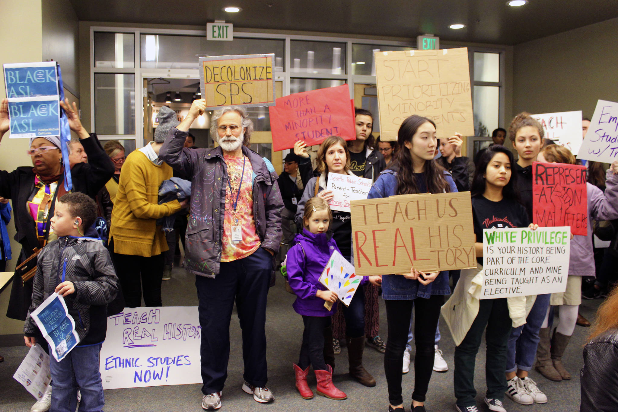 Students, parents, teachers show up at the school board meeting to support an equitable curriculum. Photo by Sara Bernard