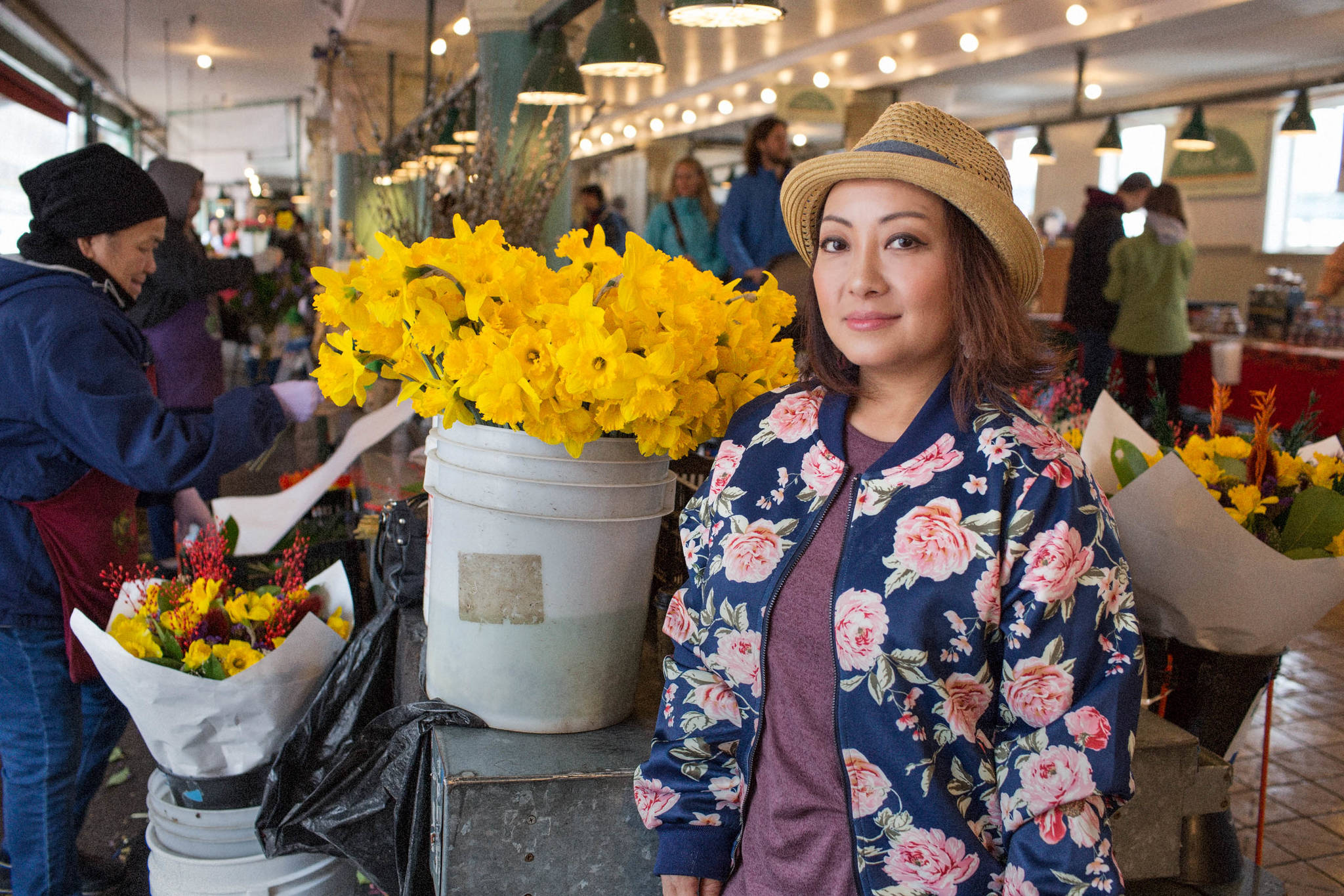 Spring daffodils are in bloom at the See Lee Farm table as Lue Eng of Thai Thao Farm pays a visit. Photographs by Rosemary Dai Ross/POSTheadshots