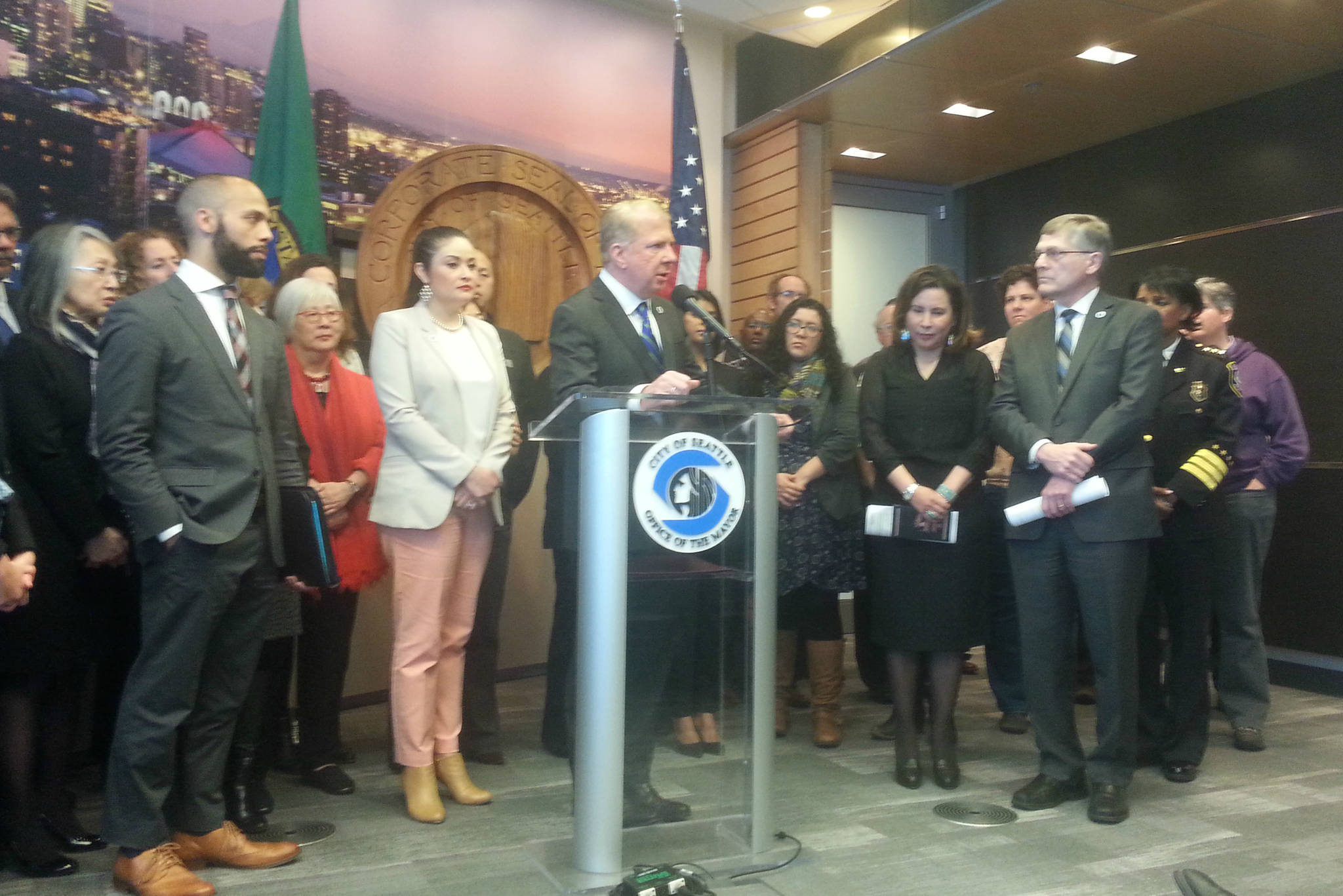 City leaders announce the lawsuit against Trump administration. Left to right: González, Murray, Juarez, Holmes. Photo by Casey Jaywork.