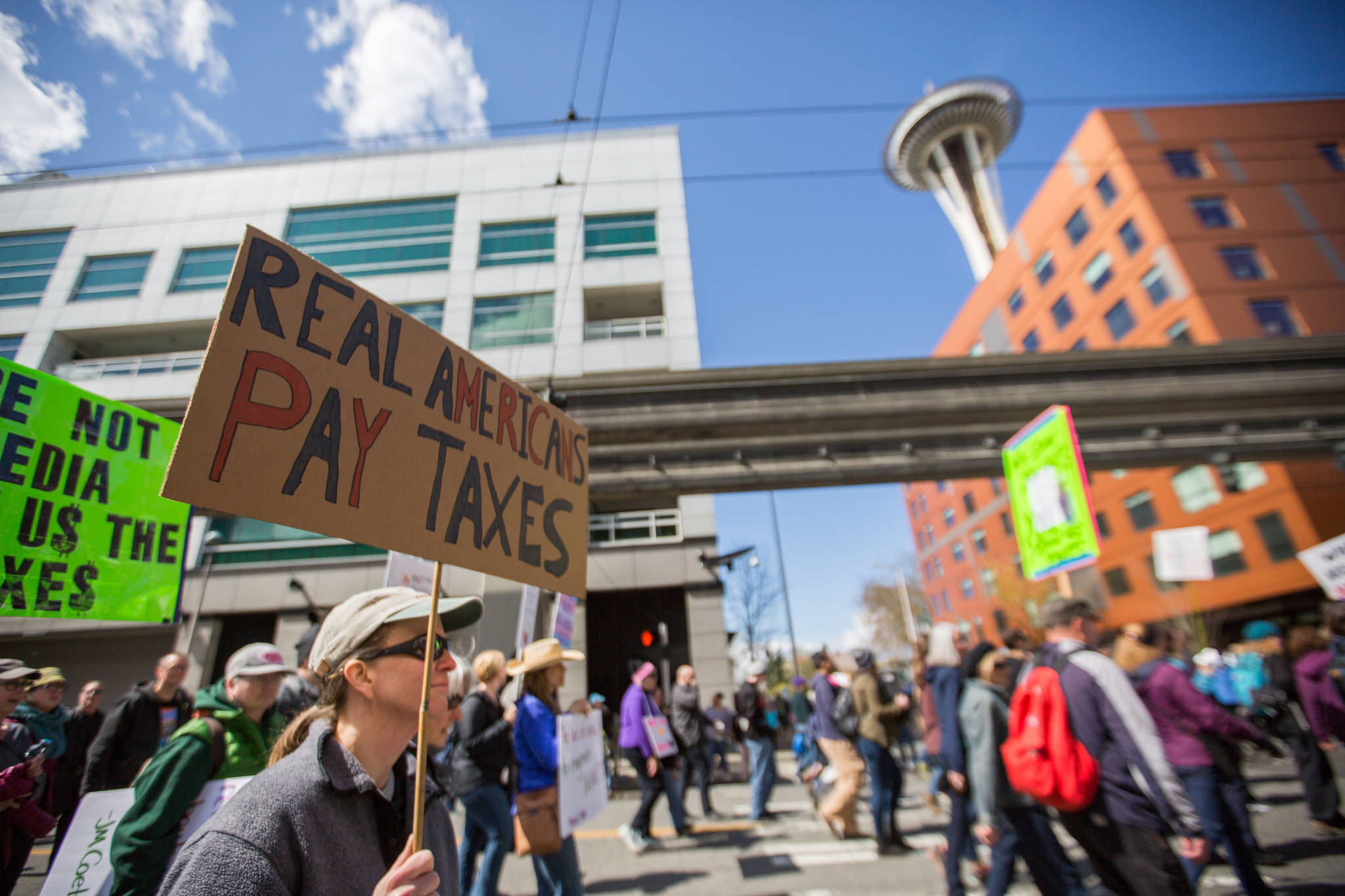 ‘We Care and We’re Aware’: More than 1,000 March Demanding Trump’s Tax Returns