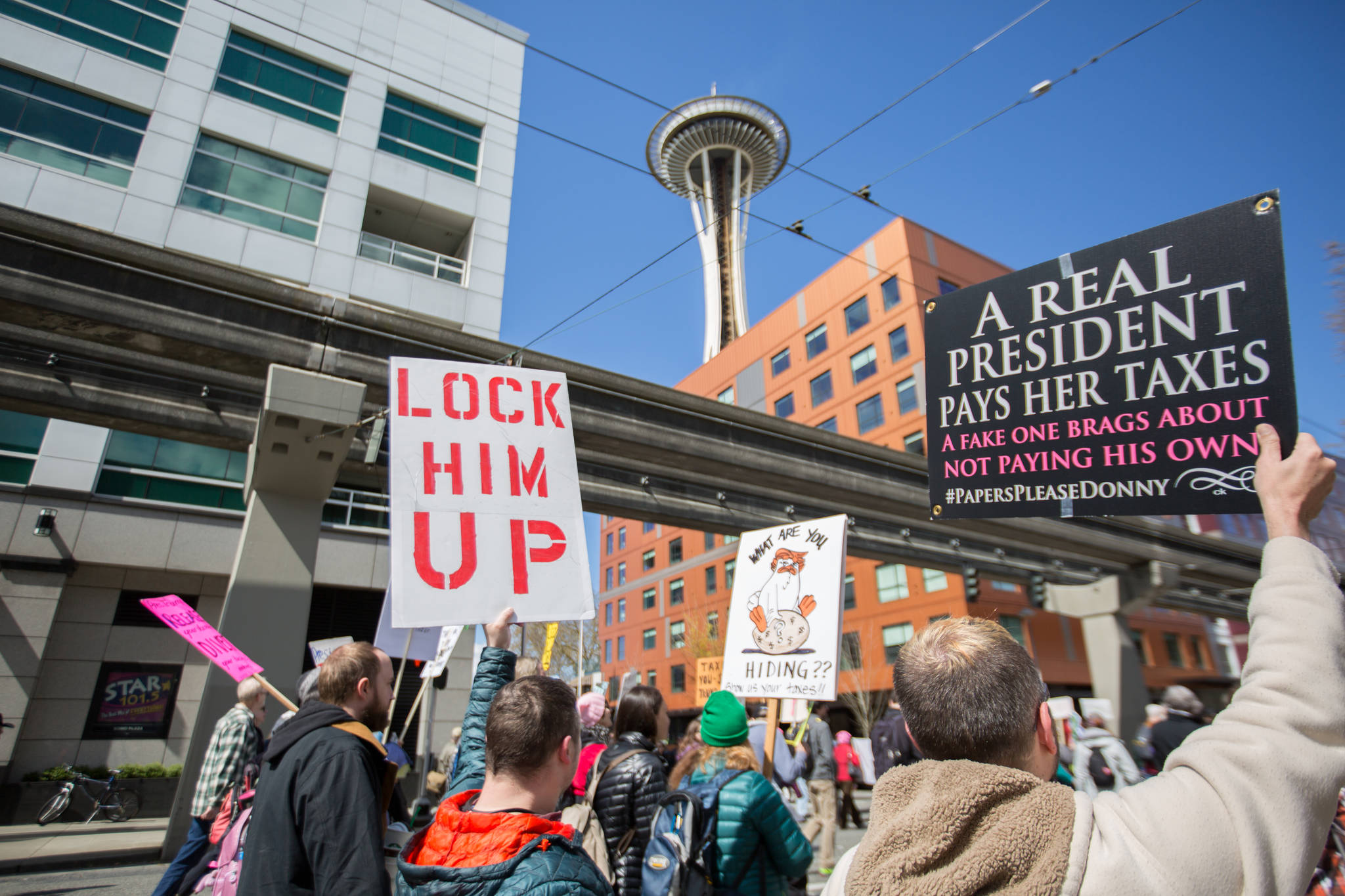 ‘We Care and We’re Aware’: More than 1,000 March Demanding Trump’s Tax Returns