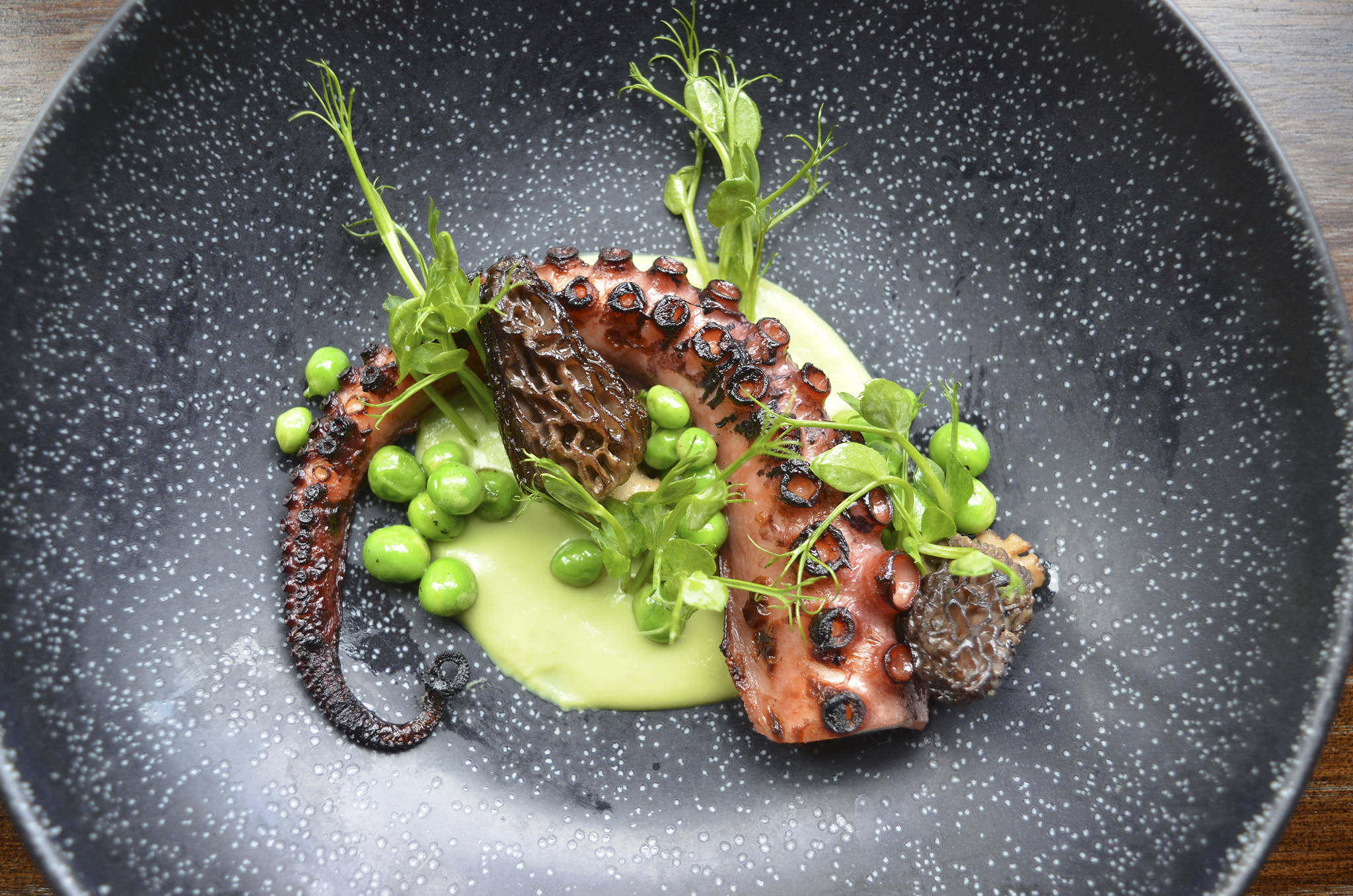The succulent octopus with pea purée. Photo by Shota Nakajima