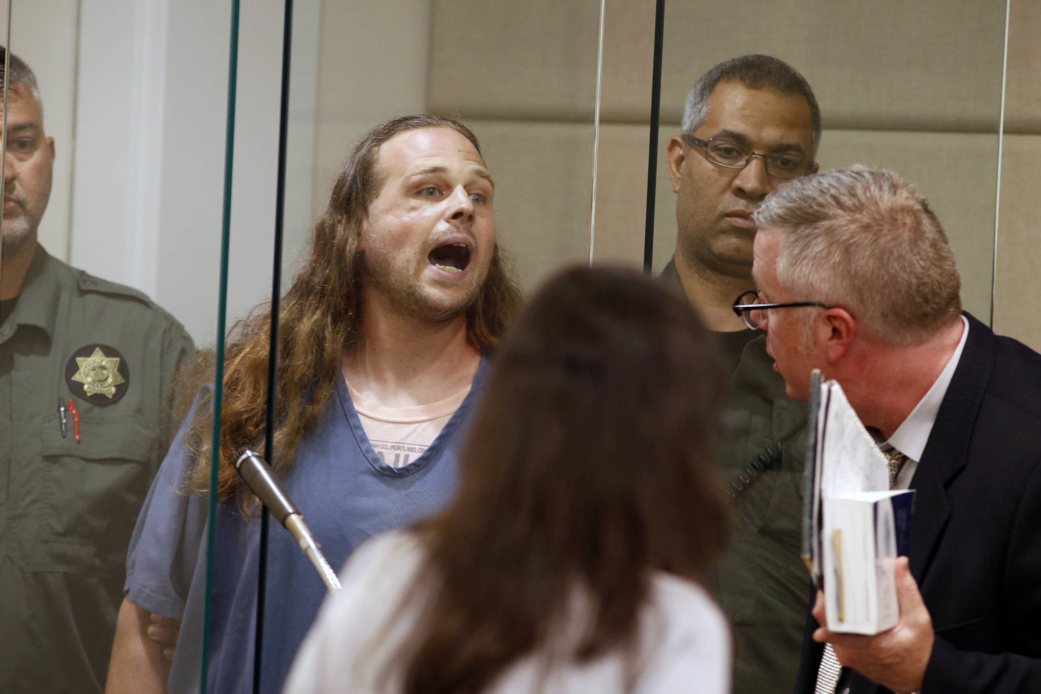 Jeremy Joseph Christian started verbally abusing two young women, including one wearing a hijab. When three men on the train intervened, police say, Christian attacked them, killing two and wounding one. Photo by Beth Nakamura/The Oregonian via AP, Pool