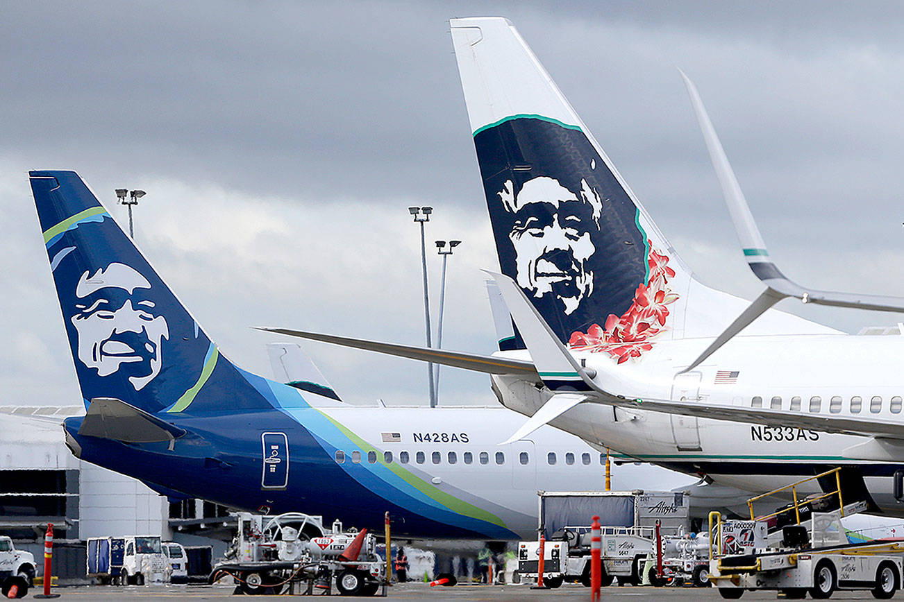 Alaska Airlines planes parked at Seattle-Tacoma International Airport in 2016. The airport is “bursting at the seams,” says Alaska. AP Photo/Ted S. Warren