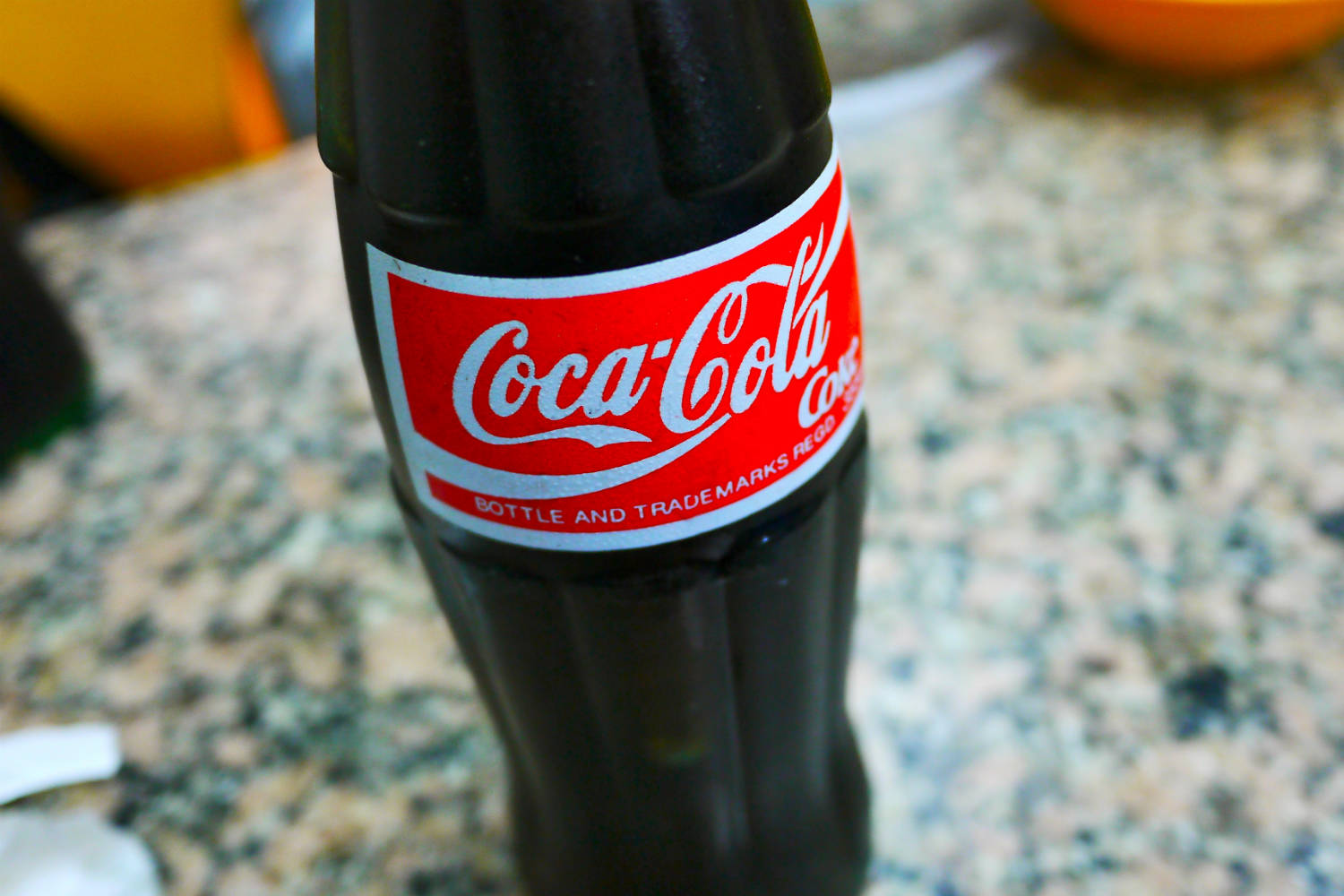 A glass Coca-Cola bottle. Photo by Edwin Leong, via Wikimedia Commons