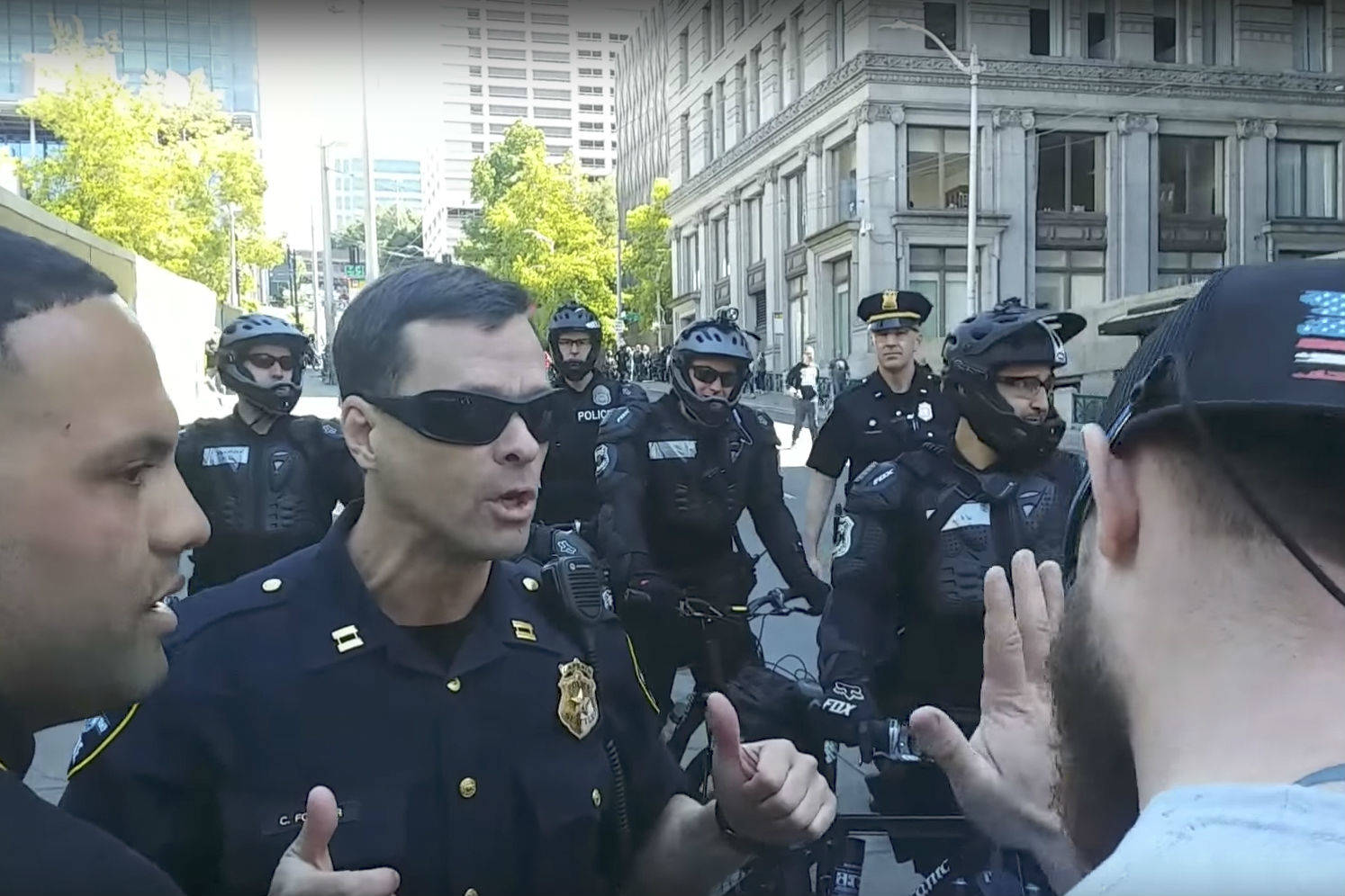 Cpt. Chris Fowler threatens to arrest two “anti-sharia” demonstrators for incitement. Screenshot via footage by Casey Jaywork