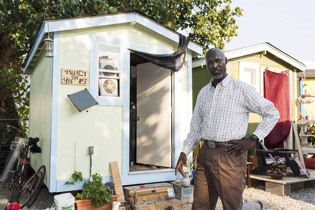 Harold Odom outside his tiny house in Georgetown. Photo by Ted Zee