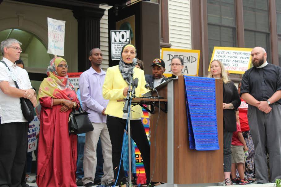 Aneelah Afzali, founder and executive director of the American Muslim Empowerment Network, speaks to a crowd of DACA supporters. Photo by Sara Bernard