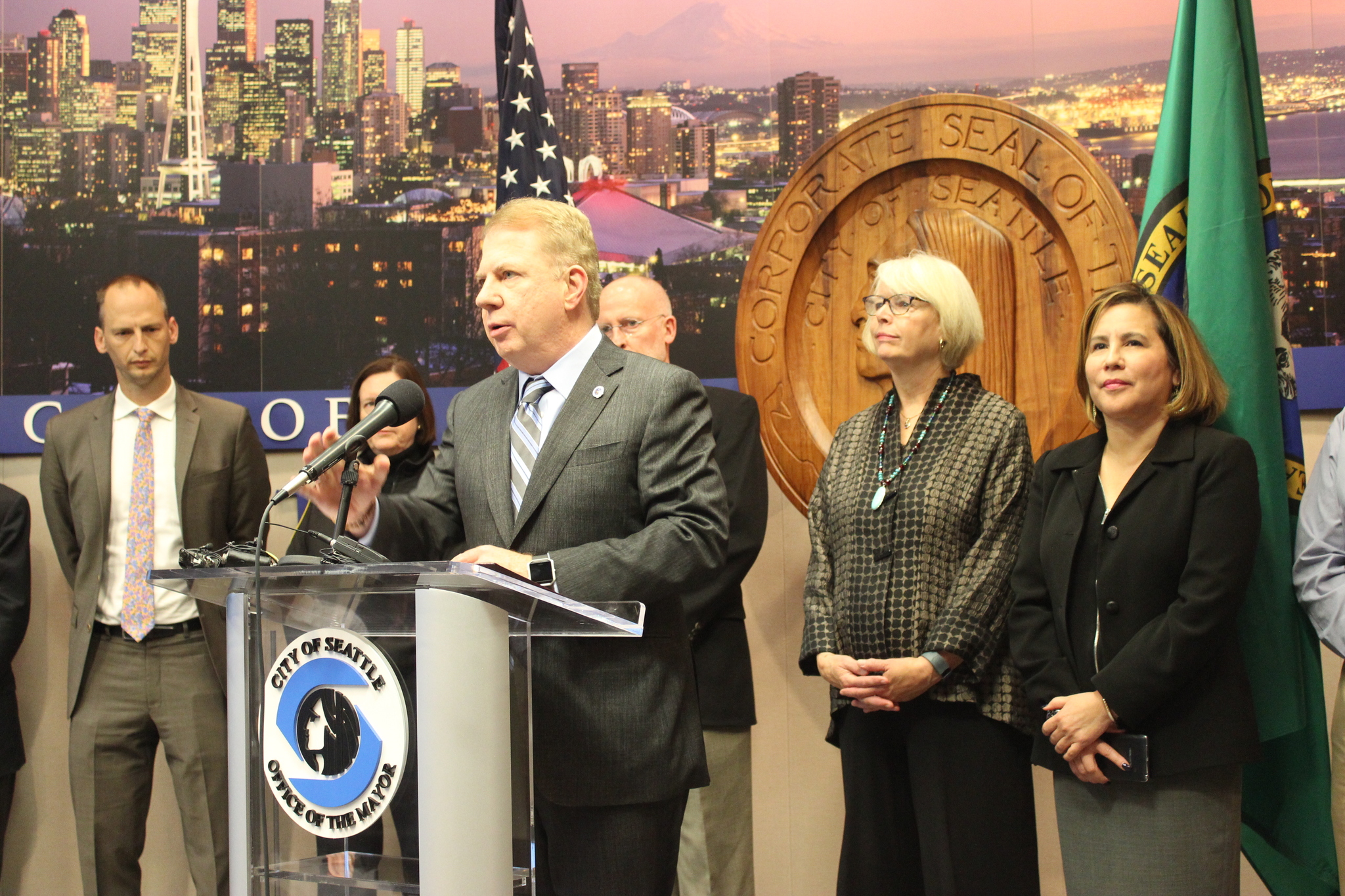 In this file photo, Mayor Ed Murray talks to reporters about homeless evictions; in the background are Councilmembers Tim Burgess, Sally Bagshaw and Debora Juarez. Photo by Casey Jaywork.