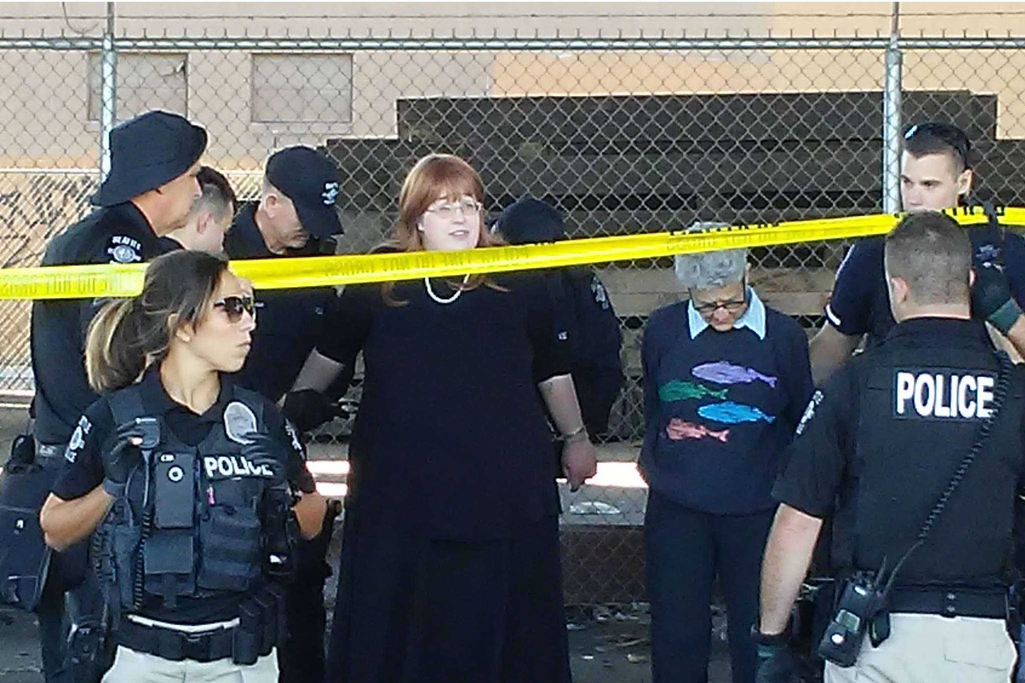 Eliana Scott-Thonnes (black dress) and another NACtivist protesting the mass eviction of homeless camps beneath the Spokane Street viaduct are arrested by SPD’s Navigation Team on Friday, September 15, 2017. Photo by NACtivist Travis Thompson
