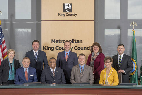 Councilmembers: (seated, from left) Jeanne Kohl-Welles, Pete von Reichbauer, Council Vice Chair Reagan Dunn, Larry Gossett, Dave Upthegrove, Council Chair Joe McDermott, Claudia Balducci,Kathy Lambert, and Council Vice Chair Rod Dembowski. Photo courtesy of King County.