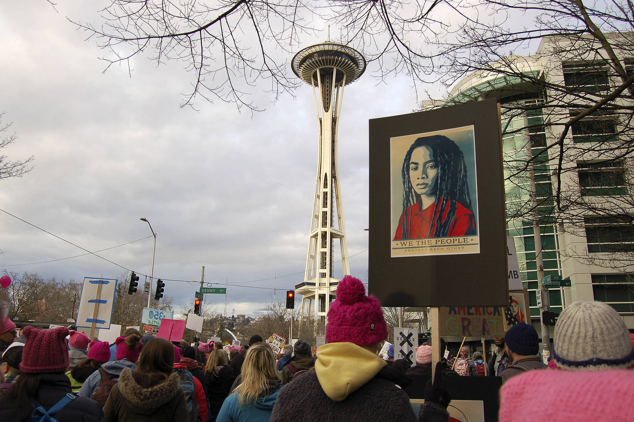 Men and women march in the Seattle Womxn’s March on inauguration day. Photo by Erin Hawkins
