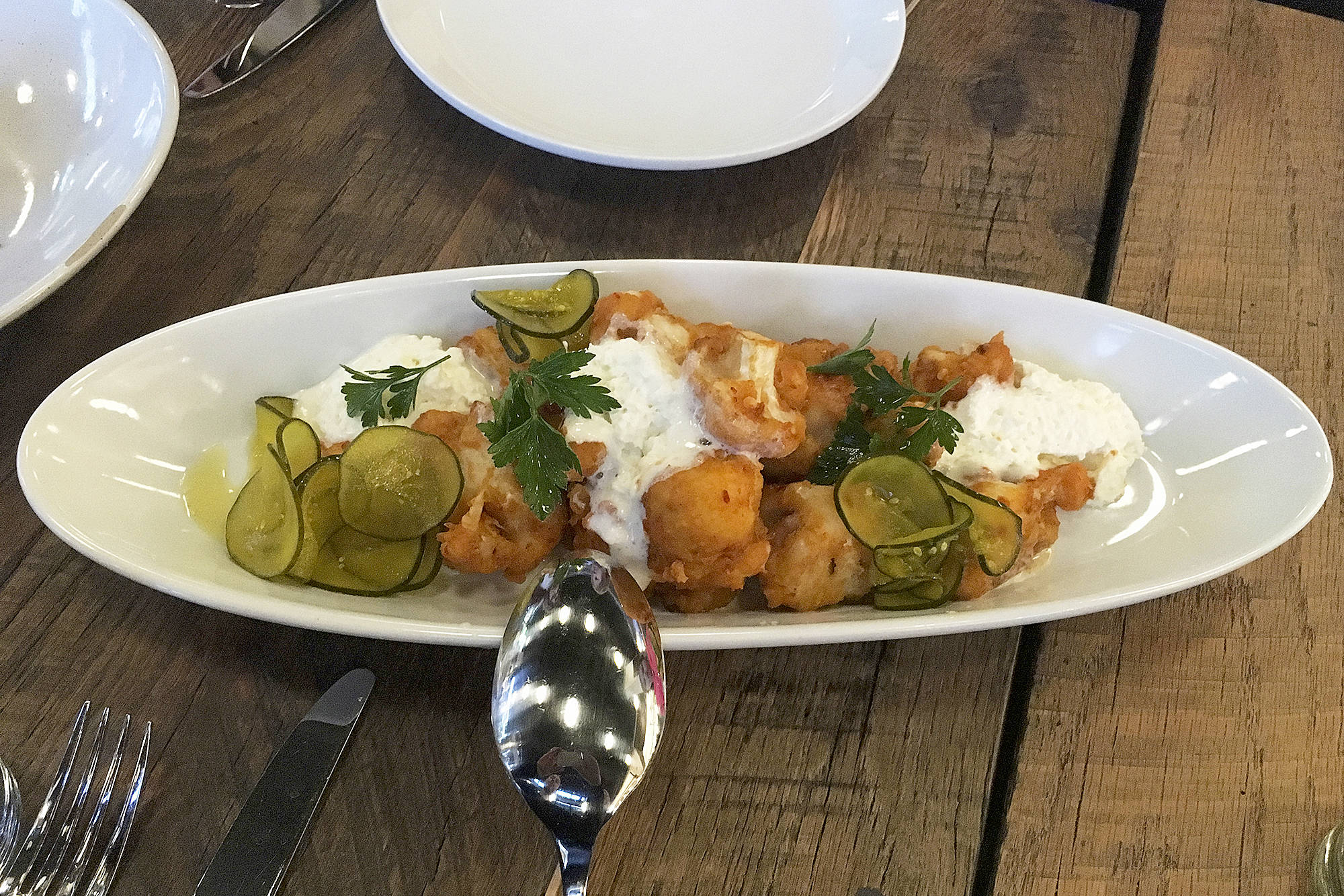The fried cauliflower with buffalo sauce and blue cheese mousse. Photo by Nicole Sprinkle