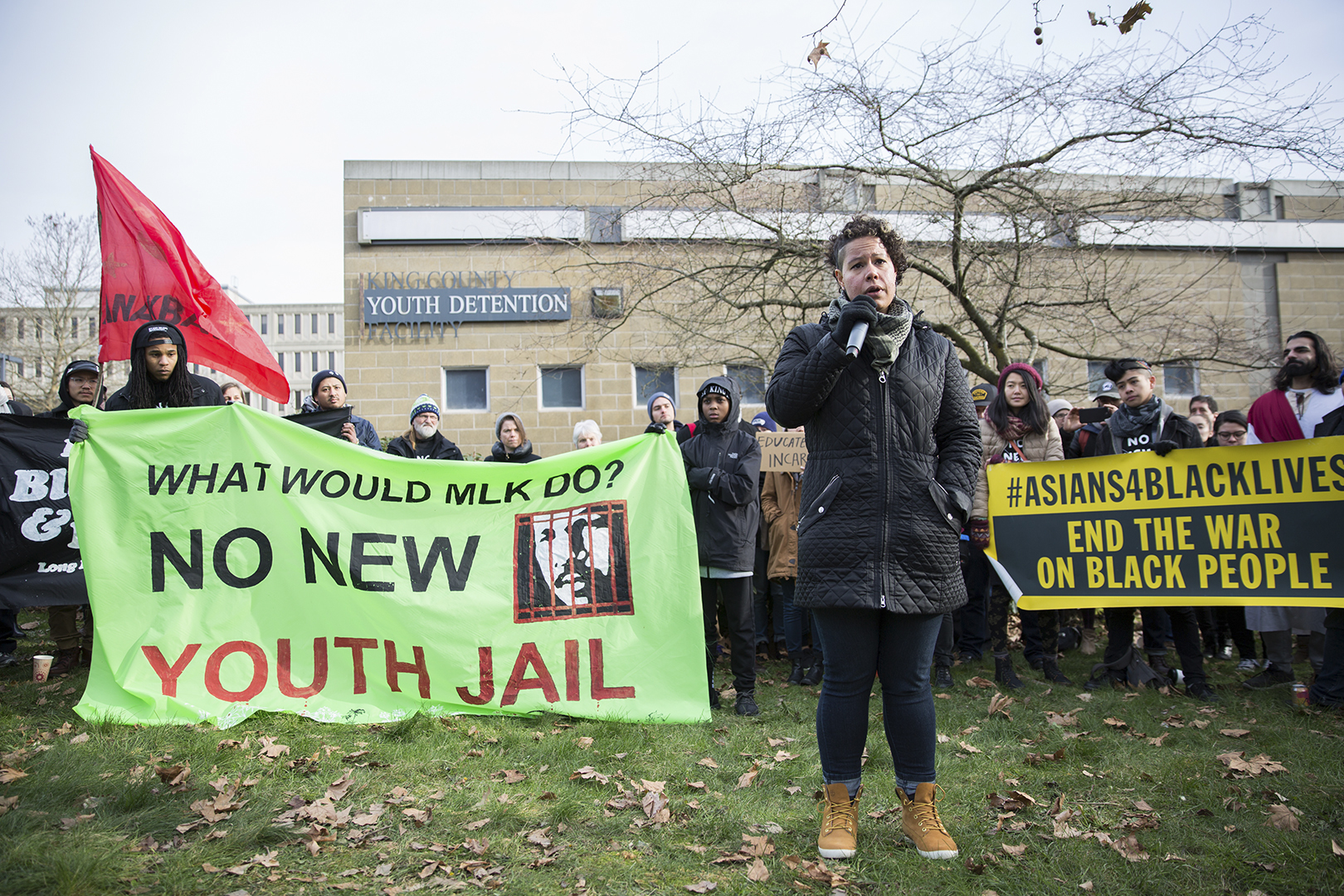 Nikkita Oliver speaks at a demonstration in front of the current King County Youth Detention Facility in January. Photo by Alex Garland