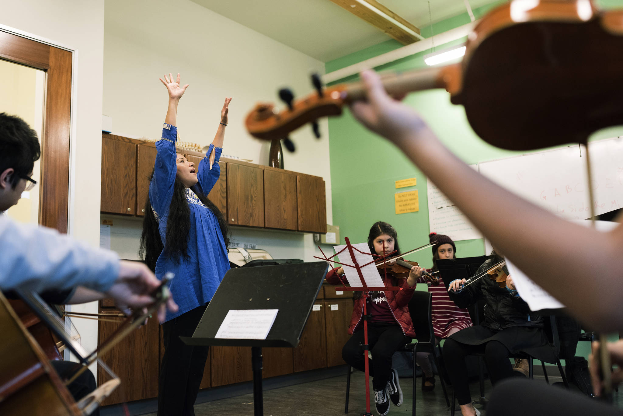 Paula Madrigal teaches young Latinx musicians via her Young String Project Outreach. Photo by Ted Zee
