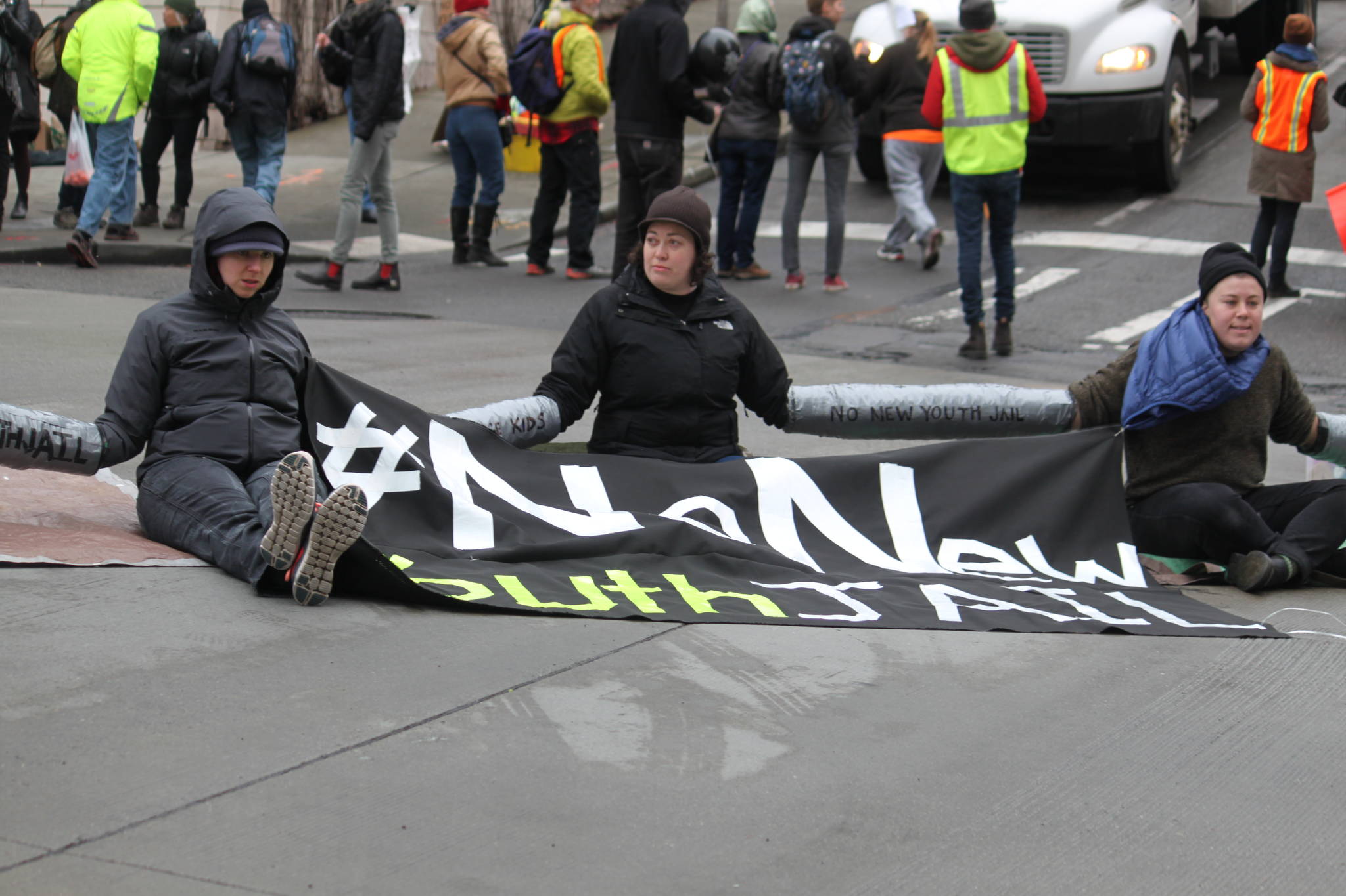 Erica Sklar (center) and fellow protestors demonstrating in solidarity with No New Youth Jail Campaign on March 12. and Photo by DJ Martinez