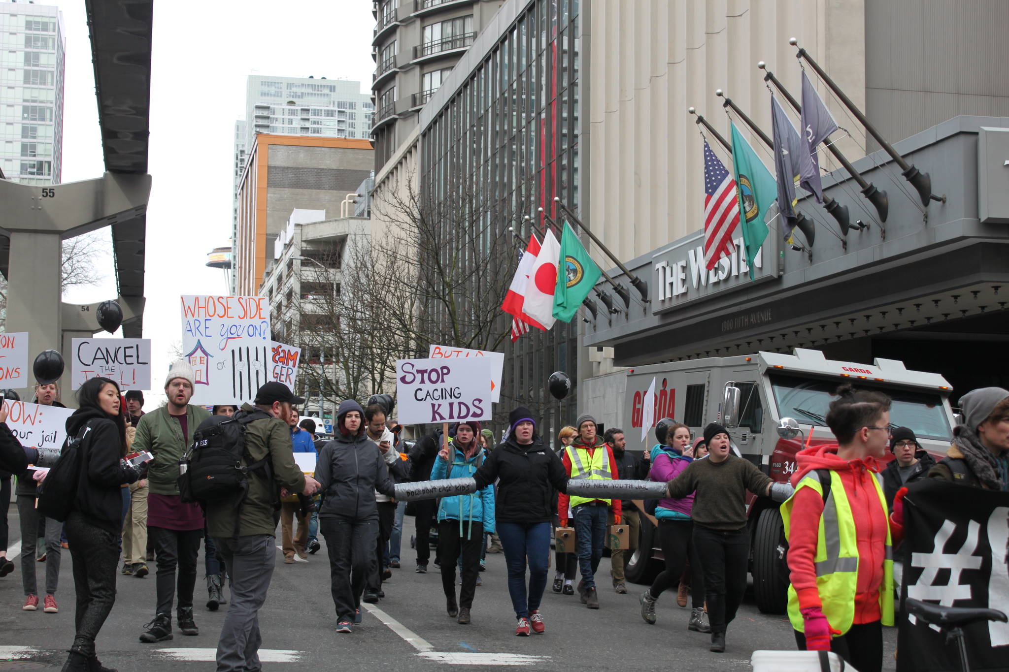 No New Youth Jail protestors block traffic on 5th Avenue on March 12. Photo by DJ Martinez