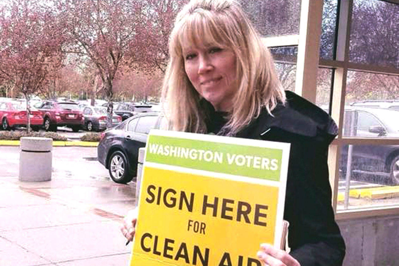 Activists Begin Collecting Signatures for Carbon Fee Initiative