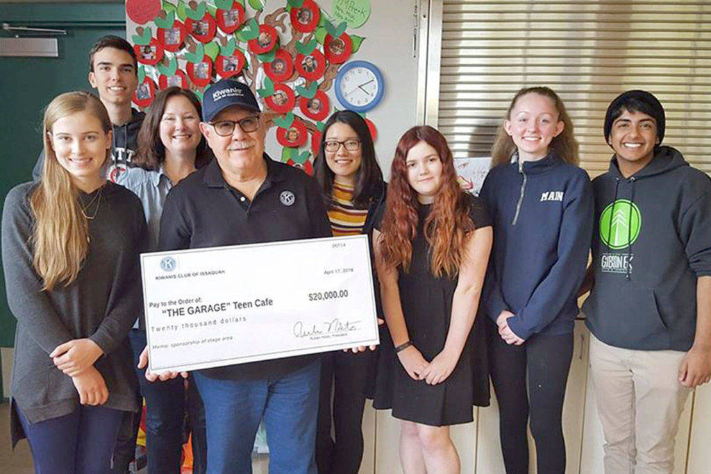 Students and representatives from the The Garage teen cafe accept a $20,000 donation from the Kiwanis Club of Issaquah. Photo by Evan Pappas