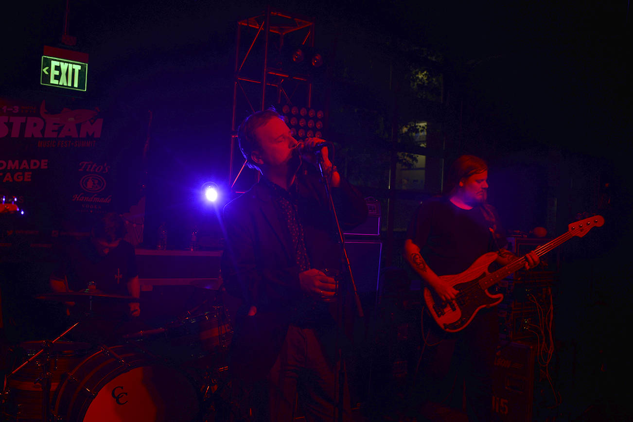 Protomartyr revels in the darkness. Photo by Seth Sommerfeld