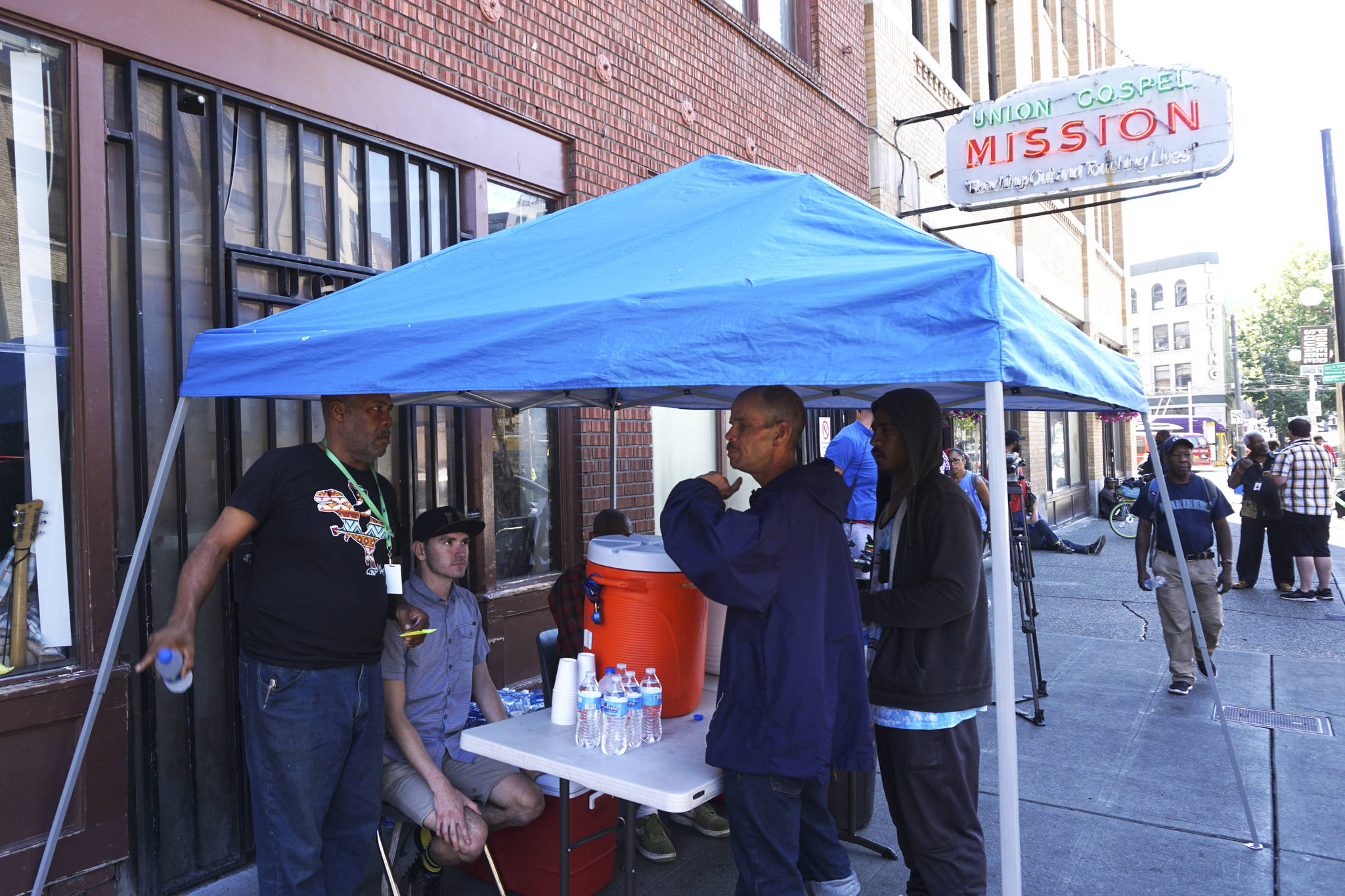 Seattle’s Union Gospel Mission hydration station serves people experiencing homelessness when the temperatures reaches the 80s. Photo by Melissa Hellmann