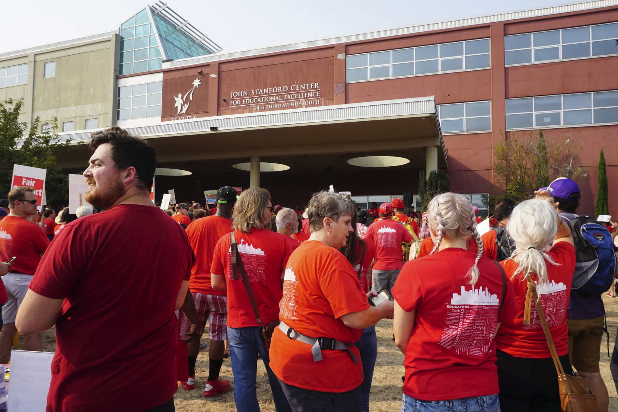 Hundreds of teachers rally outside of John Stanford Center for Educational Excellence to ask for raises in the upcoming contract with Seattle Public Schools. Photo by Melissa Hellmann