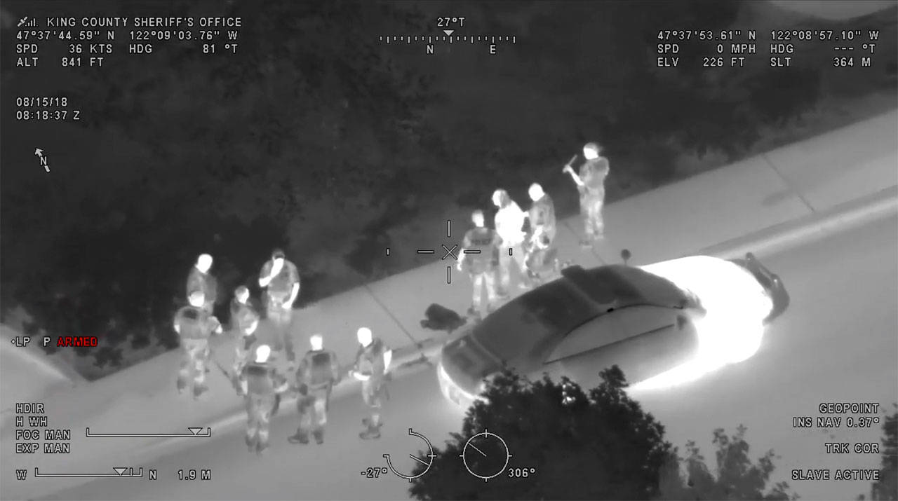 Bellevue police arrest the suspect as seen from as seen from King County Sheriff’s Guardian One helicopter. Screenshot from the King County Sheriff Air Support YouTube page