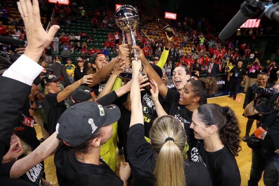 Raise a trophy for your WNBA champs. Photo via Seattle Storm Facebook
