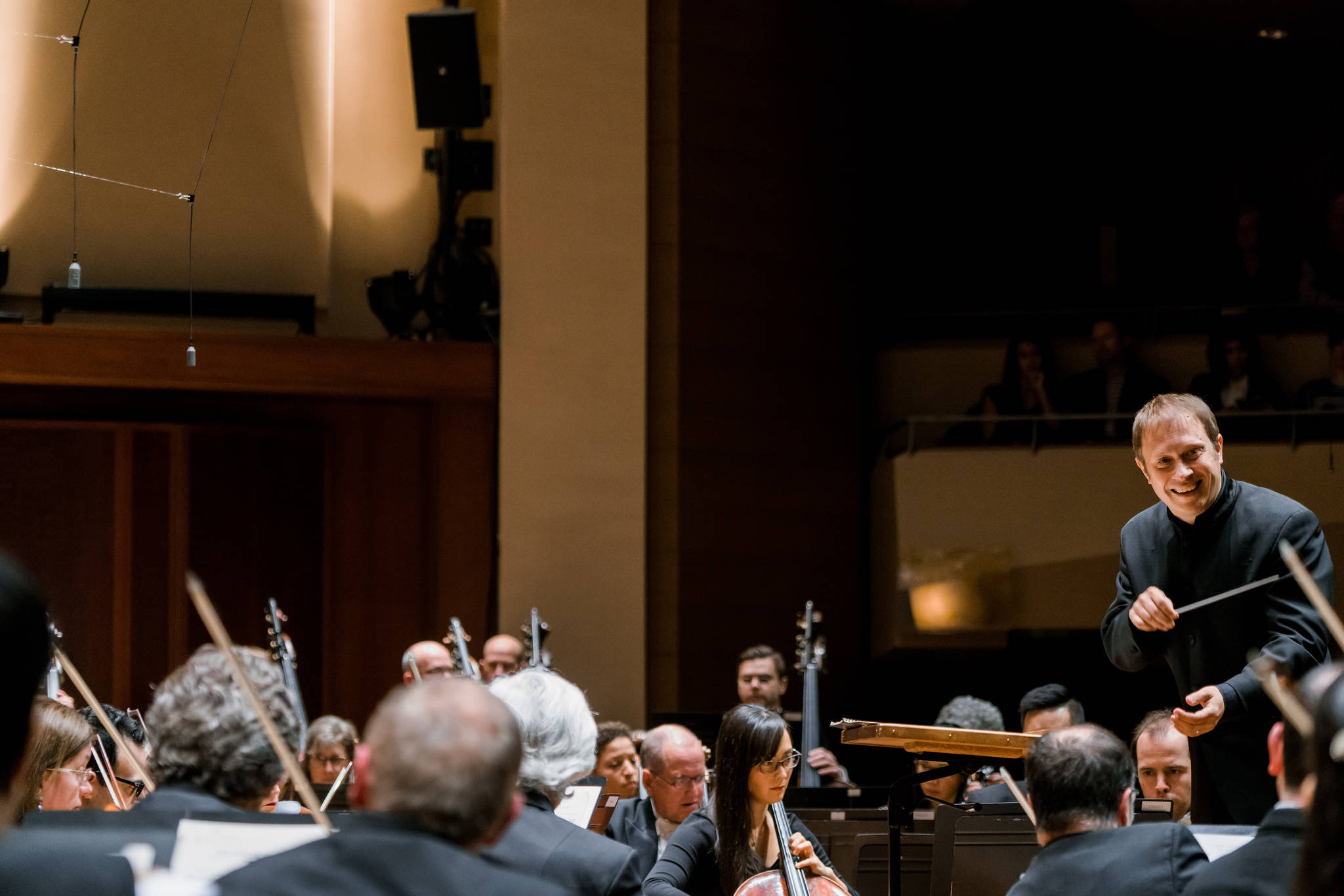 Morlot lets loose a conductor’s grin. Photo by Brandon Patoc