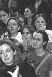 Democratic supporters react to a report that George W. Bush had won the presidential race.
