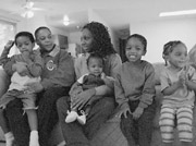A place to sit together: From left, Marquitta with son Jordan on her lap; Sharice with Armani; Jamal and Sabreeyah.