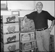 Ron Shmerelson has a stack of war supplies in the Little Red Hen's bomb shelter.