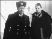 We're cursed. Ford and Neeson await K-19's launching.