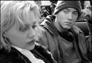 Eminem gives Murphy the evil eye.