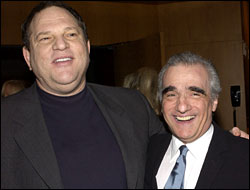 My bodyguard: Miramax honcho Weinstein towers over his pet cause, Scorsese.