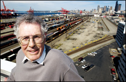 Visionary developer Frank Stagen stands on the rooftop of his marquee property, the Starbucks Center, overlooking his next field of dreams—the industrial areas of SoDo. (Below) Stagen wants an 88-acre shipping terminal to become parks, offices, condos, and a new Sonics arena.
