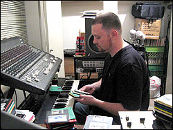 Jake One, hard at work in his home studio.