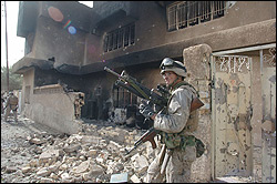 In Fallujah, a Marine secures a "neighborhood."