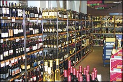 Wine at the state liquor store at Second Avenue and Seneca Street: no frills, but cheaper.