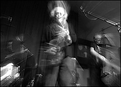 What We Live: Donald Robinson, Larry Ochs, and Lisle Ellis (from left).