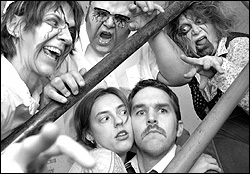 Hynes and Read (center) can't escape the horror.