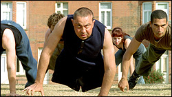 David Toole (center) in The Cost of Living.