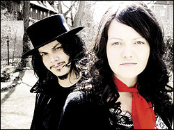 Jack White photographed just as he was about to lunge for Meg White's neck.